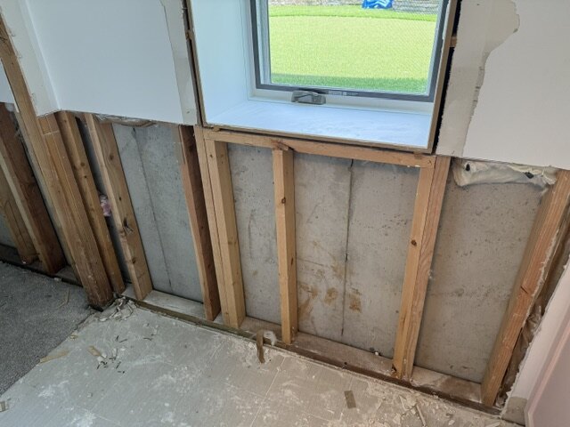 Wall stud exposure during interior remodel demolition Wichita KS