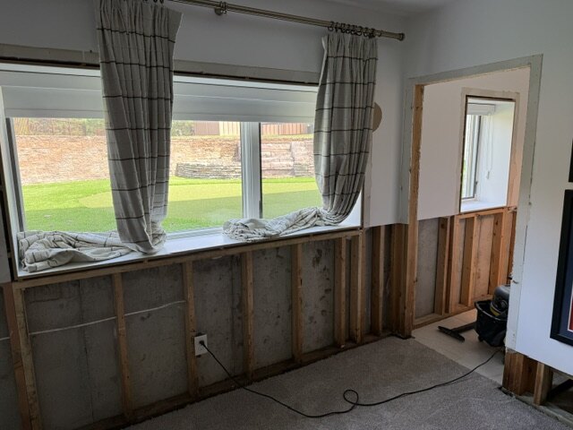 Living room water damage demolition and wall repair Wichita Kansas