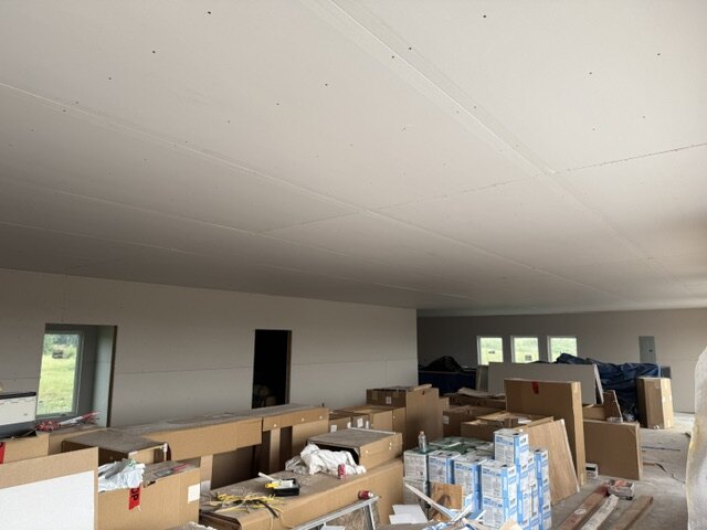 Great room drywall installation on a new home build in Wichita Kansas