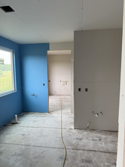 Bathroom framing with blue board drywall on new construction in Wichita Kansas