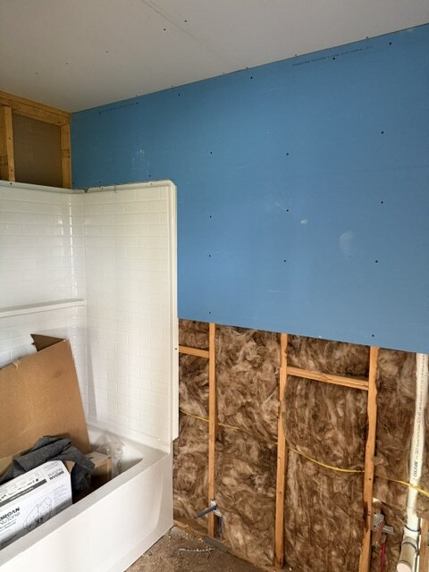 Bathtub surround installation with insulated wall framing in Wichita Kansas